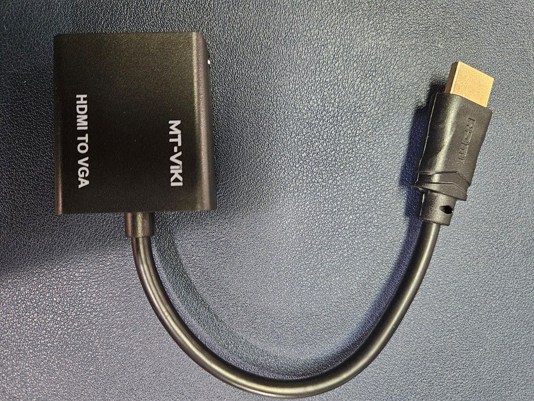 MT-VIKI HDMI to VGA Adapter Converter (Category: Cables & Adaptors) located in Pasig City. Submitted by ultrasapien (Listing ID 1449603151, Image 2). Description: - Connect HDMI devices to VGA monitors or projectors. - Converts digital HDMI signals to analog VGA. - Small and portable design. - Perfect for presentations. - Great for connecting older displays. - Compatible with laptops, PCs, and more..