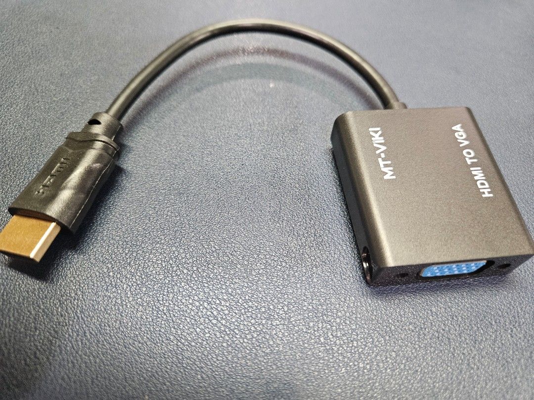 MT-VIKI HDMI to VGA Adapter Converter (Category: Cables & Adaptors) located in Pasig City. Submitted by ultrasapien (Listing ID 1449603151, Image 1). Description: - Connect HDMI devices to VGA monitors or projectors. - Converts digital HDMI signals to analog VGA. - Small and portable design. - Perfect for presentations. - Great for connecting older displays. - Compatible with laptops, PCs, and more..