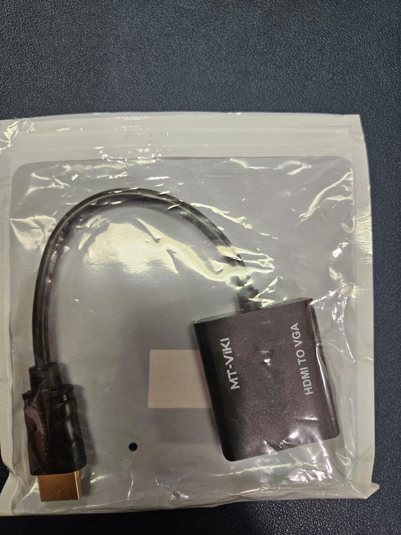 MT-VIKI HDMI to VGA Adapter Converter (Category: Cables & Adaptors) located in Pasig City. Submitted by ultrasapien (Listing ID 1449603151, Image 3). Description: - Connect HDMI devices to VGA monitors or projectors. - Converts digital HDMI signals to analog VGA. - Small and portable design. - Perfect for presentations. - Great for connecting older displays. - Compatible with laptops, PCs, and more..