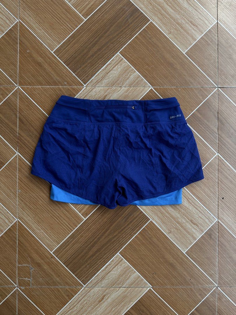 Nike Dri-FIT Blue Running Shorts with Inner Layer (Category: Activewear) located in Davao. Submitted by kurttyyo (Listing ID 1449600839, Image 2). Description: - Blue Nike running shorts - Size M - Inner layer for comfort and support - Dri-FIT material to keep you dry - Drawstring waist for adjustable fit - Ideal for workouts and runs.