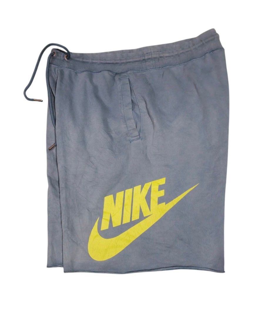 Nike Orange Basketball Shorts (Category: Activewear) located in Bacoor. Submitted by davealvare39194 (Listing ID 1449553838, Image 2). Description: Orange Nike basketball shorts. Features a dark trim with perforations down the front. Drawstring waist. Great for sports or casual wear..