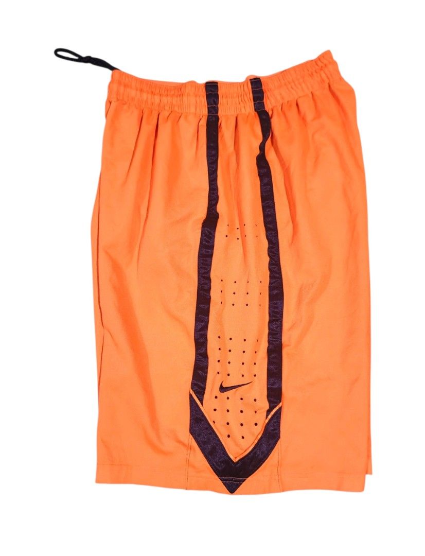 Nike Orange Basketball Shorts (Category: Activewear) located in Bacoor. Submitted by davealvare39194 (Listing ID 1449553838, Image 1). Description: Orange Nike basketball shorts. Features a dark trim with perforations down the front. Drawstring waist. Great for sports or casual wear..