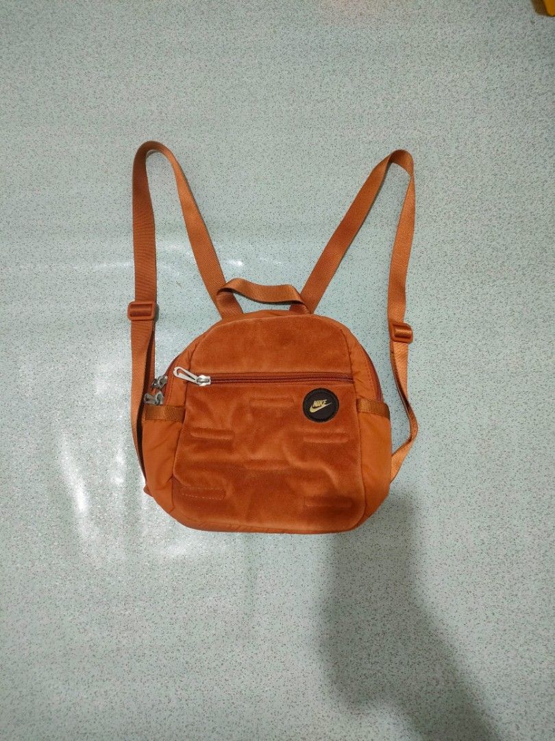 Nike Orange Velour Mini Backpack (Category: Backpacks) located in General Santos City (Dadiangas). Submitted by rjb21 (Listing ID 1449638468, Image 2). Description: - Orange velour mini backpack by Nike - Main zippered compartment - Front zippered pocket - Adjustable straps - Compact and ideal for essentials.