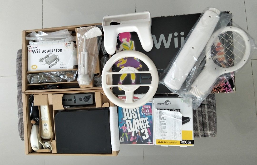 Nintendo Wii Console Bundle with Just Dance 3 & Seagate 320GB HDD (Category: Nintendo) located in Antipolo. Submitted by madu88 (Listing ID 1449611203, Image 2). Description: - Complete Set Nintendo Wii console set - Includes Wii console, controllers, and accessories - Comes with Just Dance 3 game - Includes Seagate 320GB external hard drive, 40 games - All packed in the original box - Great for parties and family fun Price: Php6,000.00 MOP: GCas