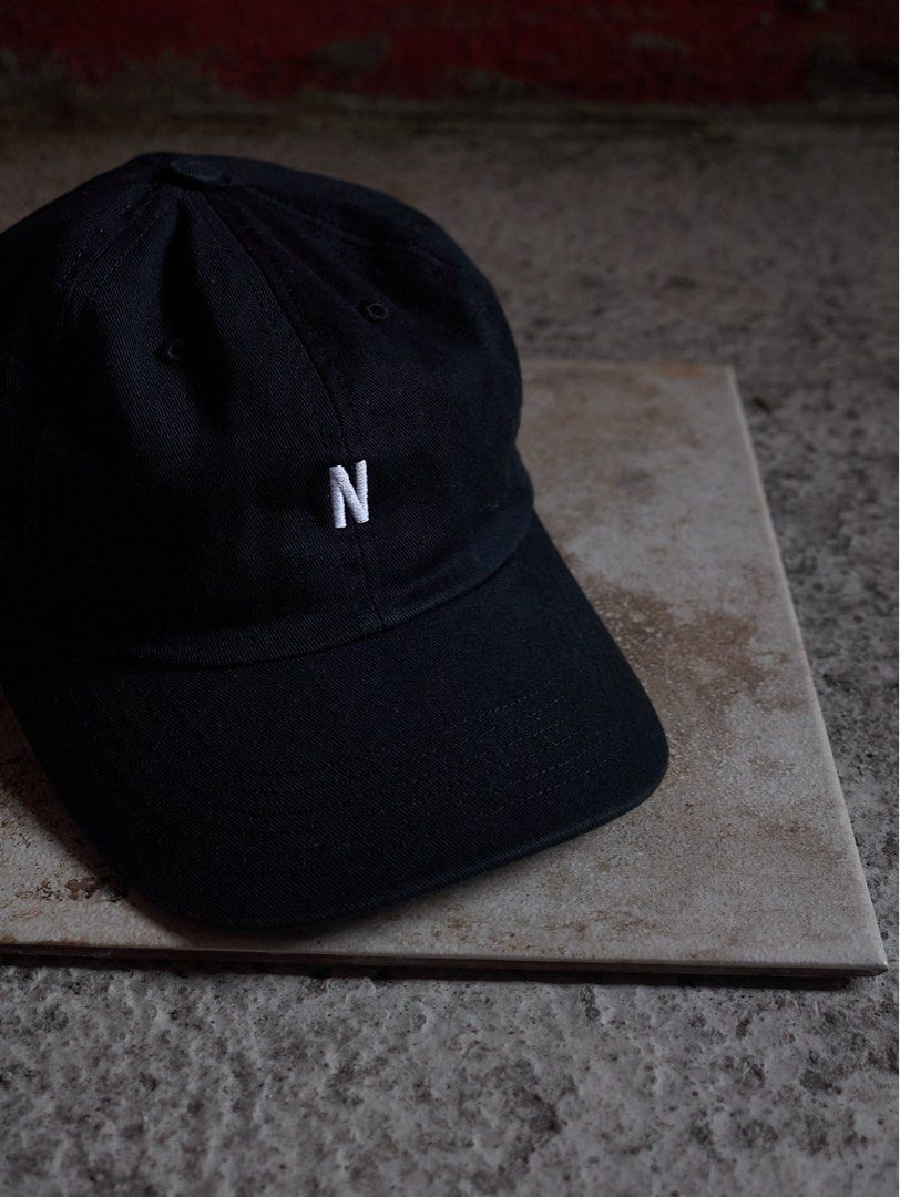 Norse Projects N Logo Baseball Cap (Category: Caps & Hats) located in Quezon City. Submitted by soourceph (Listing ID 1449736525, Image 2). Description: Minimalist five panel baseball cap. Tonal white embroidered N motif. Made in USA inquiries and offers via DM Size: Free Material: Leather, Cotton, and Nylon Condition: Excellent Color: Black/ Red/ Yellow Silhouette: Minimalist.