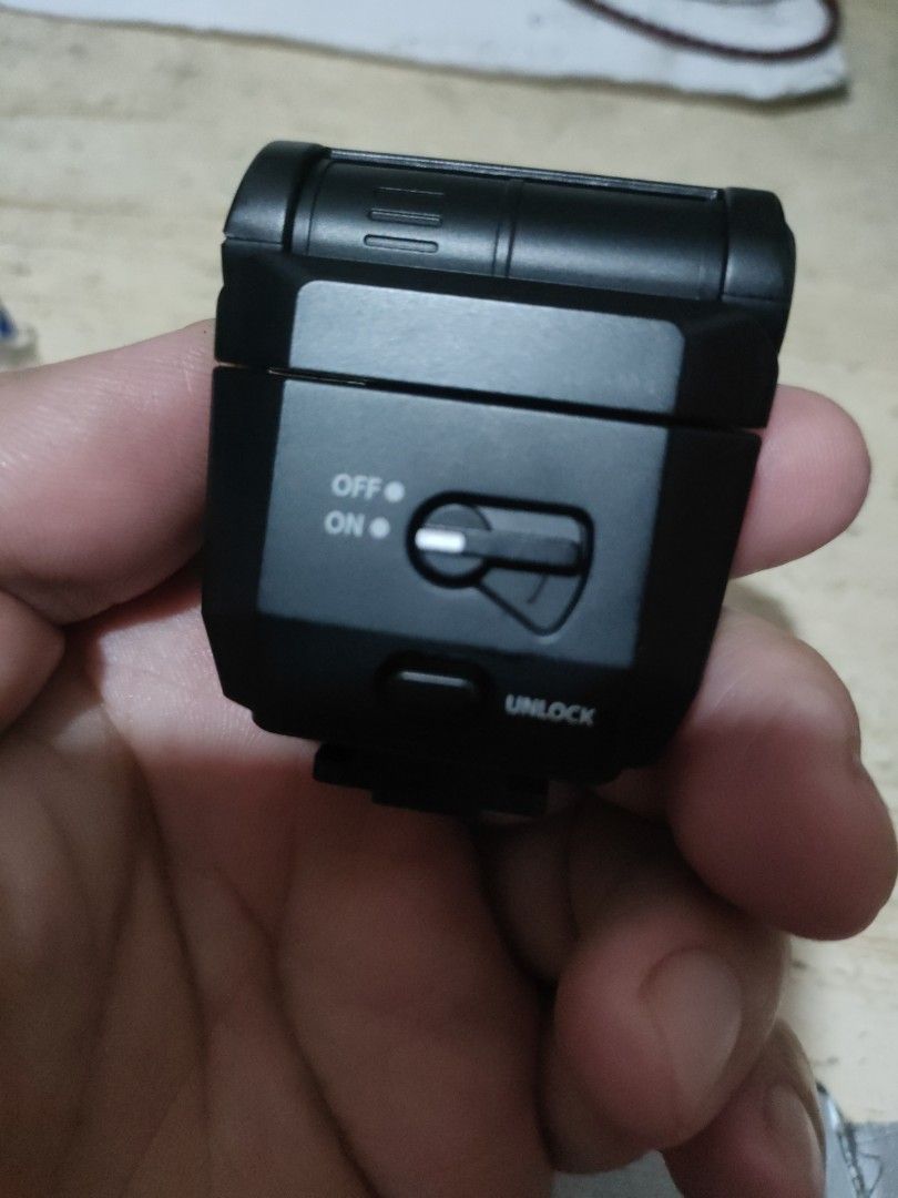 Olympus External Flash for Digital Cameras (Category: Cameras) located in Manila. Submitted by christbooth (Listing ID 1449542571, Image 2). Description: - Compact and portable Olympus external flash unit. - Features a simple ON/OFF switch and unlock button. - Hot shoe mount for easy attachment to compatible Olympus cameras. - Perfect for enhancing your photos with extra light. - Designed to work with compatible Olympus camera models..