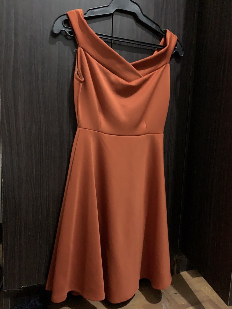Orange Off-Shoulder A-Line Dress (Category: Dresses) located in Muntinlupa City. Submitted by ivyxfolklore (Listing ID 1449640131, Image 2). Description: - Orange rust off-shoulder dress - Ideal for events or a night out - size fits small-medium .