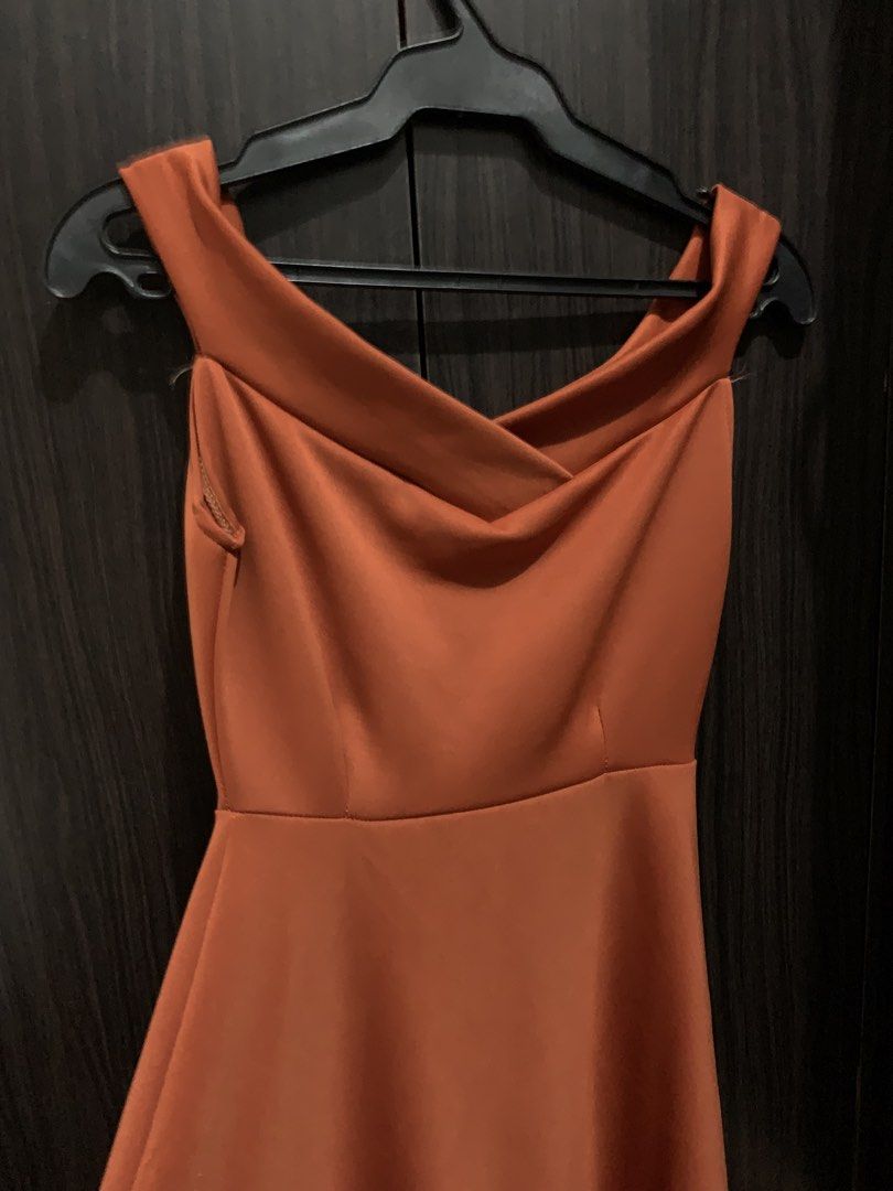 Orange Off-Shoulder A-Line Dress (Category: Dresses) located in Muntinlupa City. Submitted by ivyxfolklore (Listing ID 1449640131, Image 1). Description: - Orange rust off-shoulder dress - Ideal for events or a night out - size fits small-medium .
