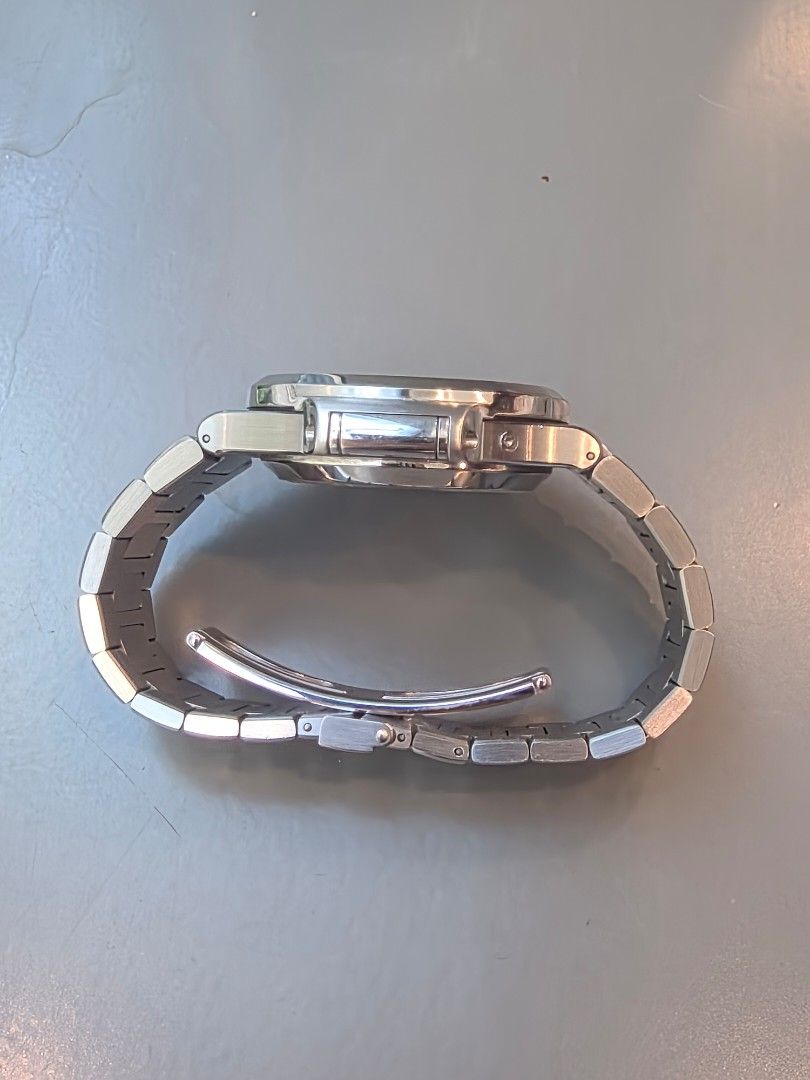 Patek Philippe Nautilus 5980/1A White Piano (Category: Watches) located in Singapore. Submitted by cabiin7 (Listing ID 1449552248, Image 2). Description: Patek philippe nautilus 5980 white piano. Mint condition, light hairline scratches. Full set dated 2013.