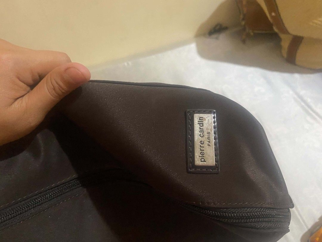 Pierre Cardin Paris Tote Bag (Category: Tote Bags) located in Cebu City. Submitted by arni1 (Listing ID 1449624920, Image 1). Description: - Authentic Pierre Cardin Paris brown tote bag - Spacious zippered main compartment for security - Internal pockets for organized storage - Elegant logo plate on the exterior - Durable metal feet on the bottom to protect the bag - Dark brown handles for a classic look - Ideal size for everyday use and carrying