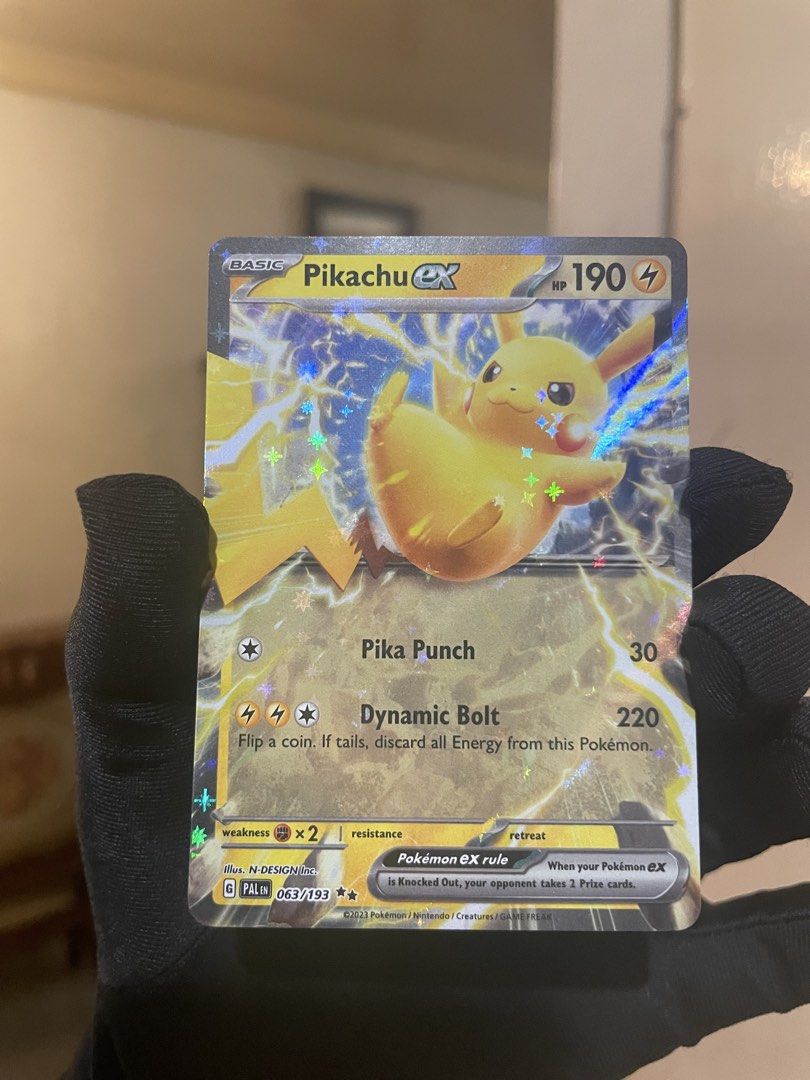 Pokemon Card Pikachu ex 063/193 Pokemon Paldea Evolved (Category: Raw Singles) located in Quezon City. Submitted by yujins-pokestop (Listing ID 1449678565, Image 2). Description: Please base the condition on the pictures shown. ‼️Card has a mark as shown‼️ 💵 Mode of Payment (MOP): GCASH/PAYMAYA 🛵 Mode of Delivery (MOD): LBC / Lalamove (Buyer shoulders sf) 📌 Location: Brgy. Sikatuna Village, Quezon City.