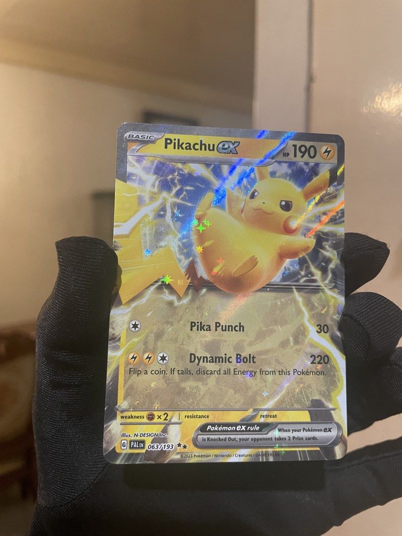Pokemon Card Pikachu ex 063/193 Pokemon Paldea Evolved (Category: Raw Singles) located in Quezon City. Submitted by yujins-pokestop (Listing ID 1449678565, Image 3). Description: Please base the condition on the pictures shown. ‼️Card has a mark as shown‼️ 💵 Mode of Payment (MOP): GCASH/PAYMAYA 🛵 Mode of Delivery (MOD): LBC / Lalamove (Buyer shoulders sf) 📌 Location: Brgy. Sikatuna Village, Quezon City.