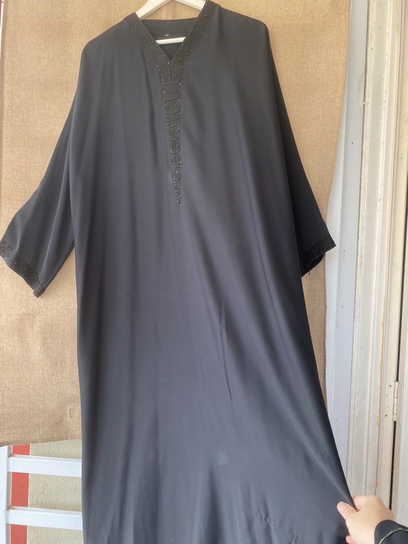 Preloved Abaya Nidha Simple (Category: Kaftans & Jubahs) located in Batu Pahat. Submitted by mierabell (Listing ID 1449570989, Image 1). Description: Preloved Abaya Nidha Simple 📝 Rm20 📌 Dada 52” | Labuh 54.5” 📌 Material Nidha 📌 Cutting : Straight 📌 Sarung Condition ok. Manik rhinestone di hujung lengan dan leher. Ade a few defect 1. Kesan iron ( tak nampak sangat) 2. ⁠Tercarik di bottom baju Harga exclusive postage 📌 postage SM Rm8, SS RM1