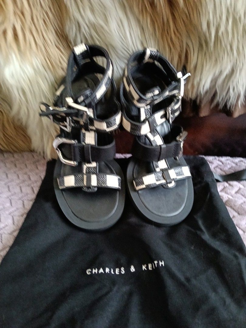 Preloved items (Category: Sneakers & Footwear) located in Ipoh. Submitted by tresora77 (Listing ID 1449588705, Image 1). Description: this Charles and Keith gladiator sandals never been used,it's brandnew size is 34.for small size.