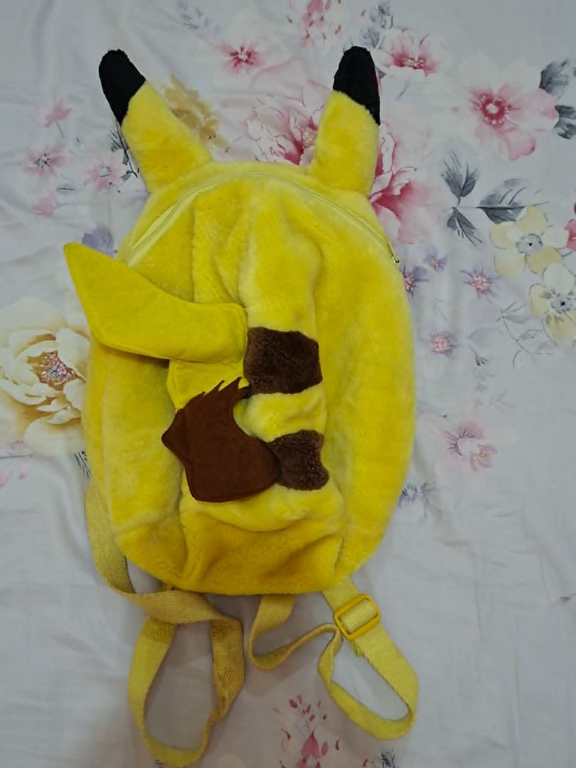 [preloved] Pikachu Plush Backpack (Category: Backpacks) located in Las Pinas. Submitted by seriscorner (Listing ID 1449536939, Image 2). Description: Once lang ito nagamit but natambak ng matagal sa closet at nagkaron sya ng mga tanga (stains). This is from my personal collection. Bawal sa maarte. fixed price na ang 300 - Adorable Pikachu plush backpack - Perfect for kids and Pokemon enthusiasts - Features adjustable straps - Plenty of use left f