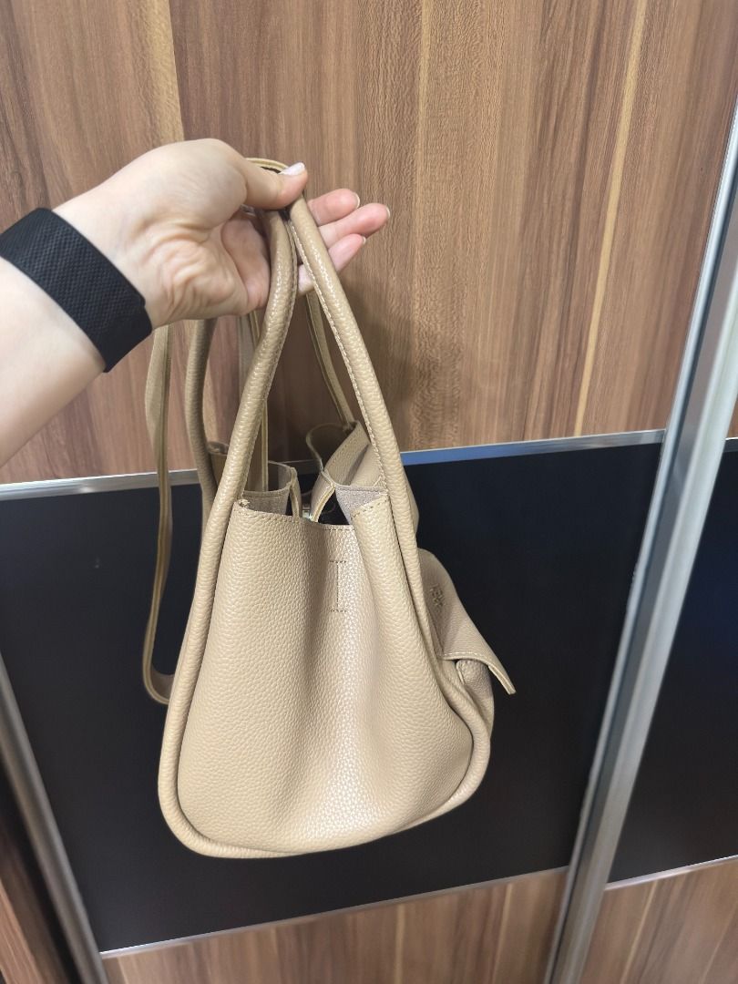 PREM Multi-Way Tote Bag with Pouch – Warm Beige (Category: Shoulder Bags) located in Quezon City. Submitted by declutterwithsk (Listing ID 1449642708, Image 2). Description: ✨ PREM Multi-Way Tote Bag with Pouch – Warm Beige ₱1,200 Selling my PREM Multi-Way Tote Bag purchased in Bangkok, Thailand. Used only a few times and still in like-new condition. The bag is spacious, versatile, and can be styled in multiple ways to suit your look. ✅ Inclusion