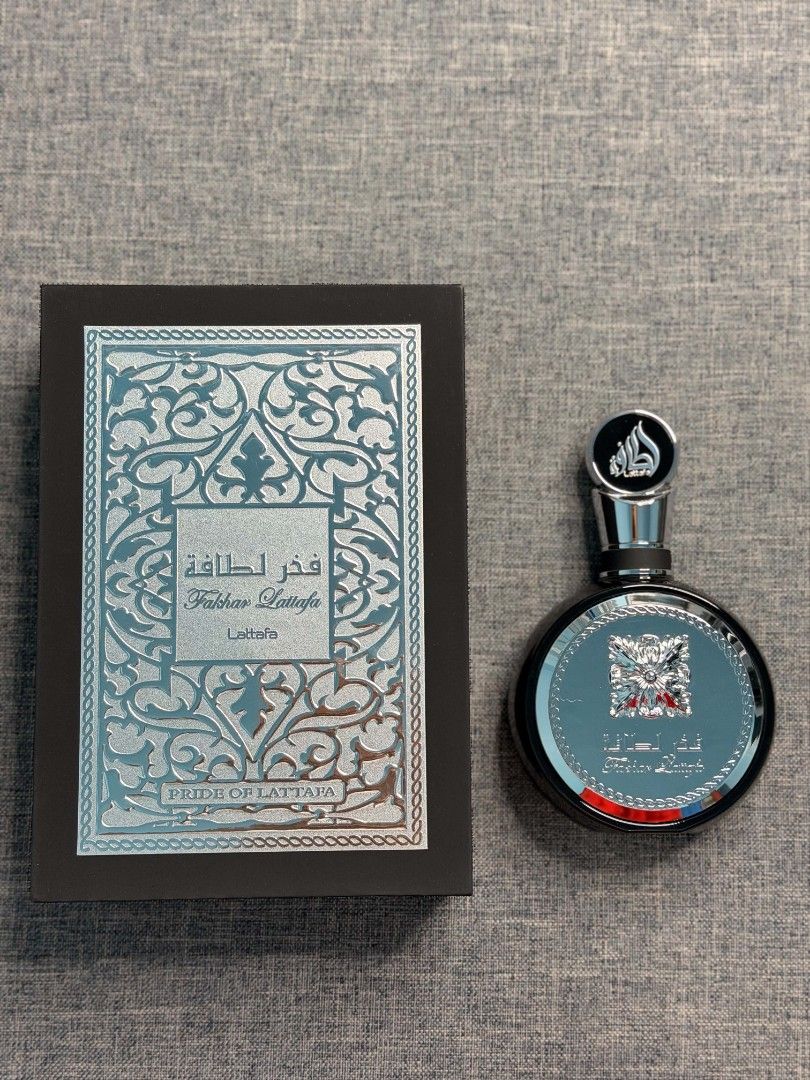 Pride of Lattafa Perfume (Category: Fragrance & Deodorants) located in Paranaque City. Submitted by barbs24 (Listing ID 1449645753, Image 1). Description: - Pride of Lattafa Perfume - Comes in a nice, presentable box - Features a round bottle with a stylish silver and blue design - Offers a great, versatile scent suitable for anyone - Sold as is.
