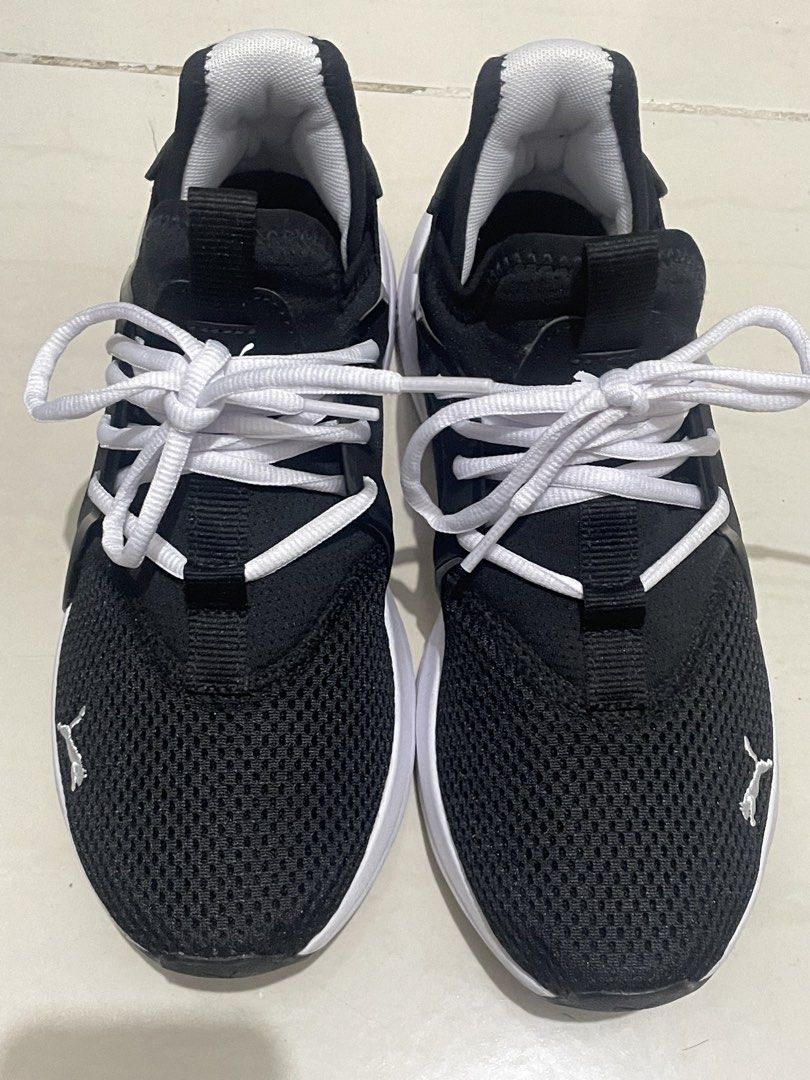 Puma Softfoam+ Black White Sneakers US 6 (Category: Sneakers) located in Pasig City. Submitted by allexis_izabelle (Listing ID 1449589428, Image 1). Description: - PUMA Unisex Softride Enzo Evo Running Shoes - Features Softfoam+ for all-day cushioning and comfort - Lace-up closure - Ideal for everyday wear or light workouts - Size: US 6 - RFS: too small - Bought in Saudi, no box included - Used twice only - Good for running.