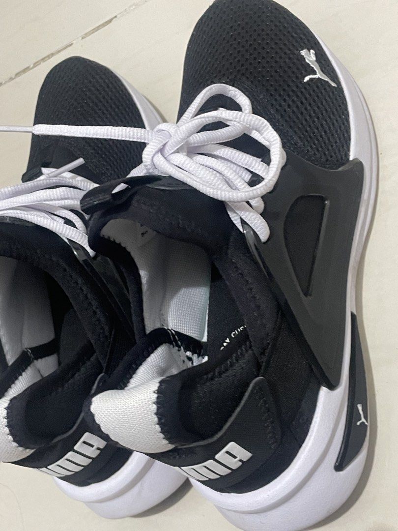 Puma Softfoam+ Black White Sneakers US 6 (Category: Sneakers) located in Pasig City. Submitted by allexis_izabelle (Listing ID 1449589428, Image 2). Description: - PUMA Unisex Softride Enzo Evo Running Shoes - Features Softfoam+ for all-day cushioning and comfort - Lace-up closure - Ideal for everyday wear or light workouts - Size: US 6 - RFS: too small - Bought in Saudi, no box included - Used twice only - Good for running.