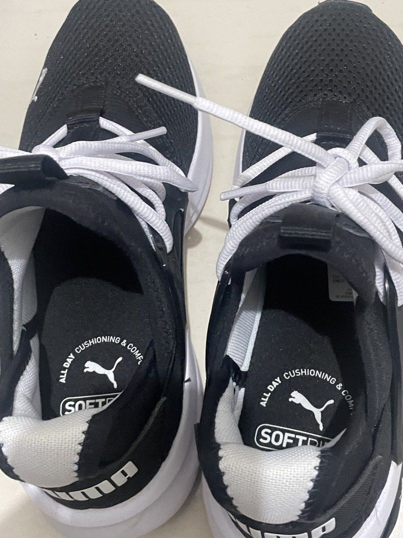 Puma Softfoam+ Black White Sneakers US 6 (Category: Sneakers) located in Pasig City. Submitted by allexis_izabelle (Listing ID 1449589428, Image 3). Description: - PUMA Unisex Softride Enzo Evo Running Shoes - Features Softfoam+ for all-day cushioning and comfort - Lace-up closure - Ideal for everyday wear or light workouts - Size: US 6 - RFS: too small - Bought in Saudi, no box included - Used twice only - Good for running.