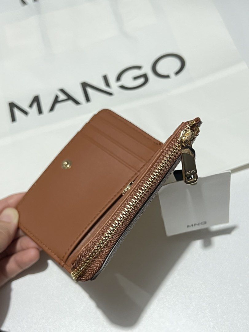 Rattan Style Mango Woven Straw & Leather Zip Around Wallet (Category: Wallets & Card holders) located in Las Pinas. Submitted by baediola (Listing ID 1449665643, Image 3). Description: Brand New With tag With paper bag No flaws - Cute woven straw wallet with brown leather trim. - Secure zip-around closure. - Interior features card slots and a button snap compartment. - Perfect for keeping your essentials organized. - Small and compact design..