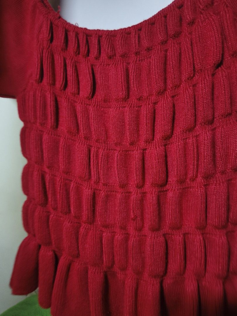 Red knitted puff sleeve top (Category: Others Tops) located in Manila. Submitted by letthingsgo_ (Listing ID 1449588827, Image 2). Description: small size.