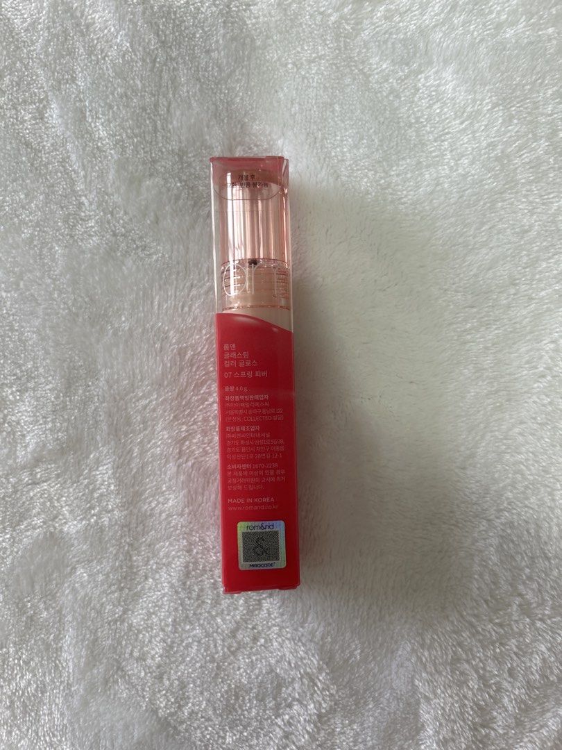 Rom&nd Glasting Color Gloss 07 Spring Fever (Category: Makeup) located in Manila. Submitted by tprdo09 (Listing ID 1449592528, Image 2). Description: - Romand Glasting Color Gloss - Shade: 07 Spring Fever - Provides a beautiful shine - Popular K-beauty lip product - Ideal for a natural, glossy lip look - Features clear packaging with a pink cap.