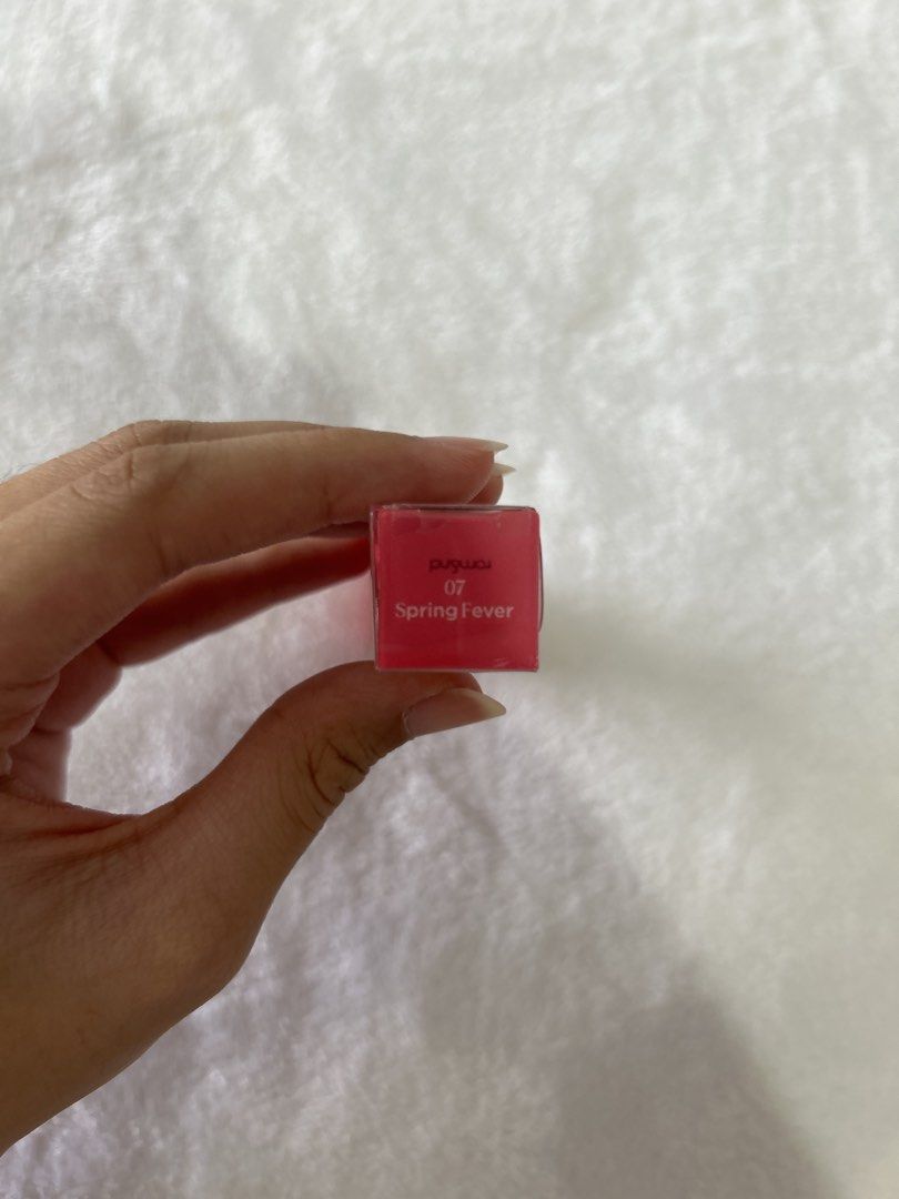 Rom&nd Glasting Color Gloss 07 Spring Fever (Category: Makeup) located in Manila. Submitted by tprdo09 (Listing ID 1449592528, Image 3). Description: - Romand Glasting Color Gloss - Shade: 07 Spring Fever - Provides a beautiful shine - Popular K-beauty lip product - Ideal for a natural, glossy lip look - Features clear packaging with a pink cap.