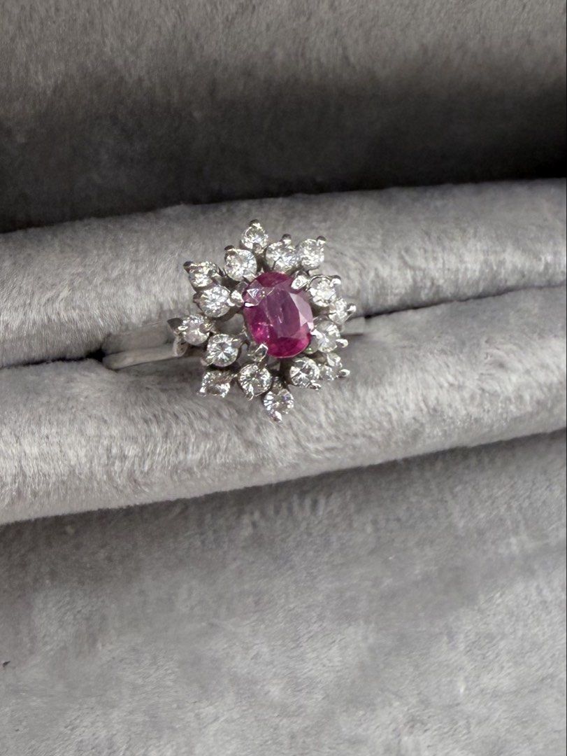 Ruby Diamond Ring (Category: Rings) located in Singapore. Submitted by Tenasious (Listing ID 1449656493, Image 1). Description: This Unique piece is a definite stunner, the masterfull combination of Ruby and unique placement of the Diamond to surround the Ruby Ruby Diamond Ring Natural Ruby Natural Diamond 0.43 carat with PT900 hallmark 4.19 grams A showstopping Ring! Local certification & Repolishing can be arranged within 2 days at a small addi