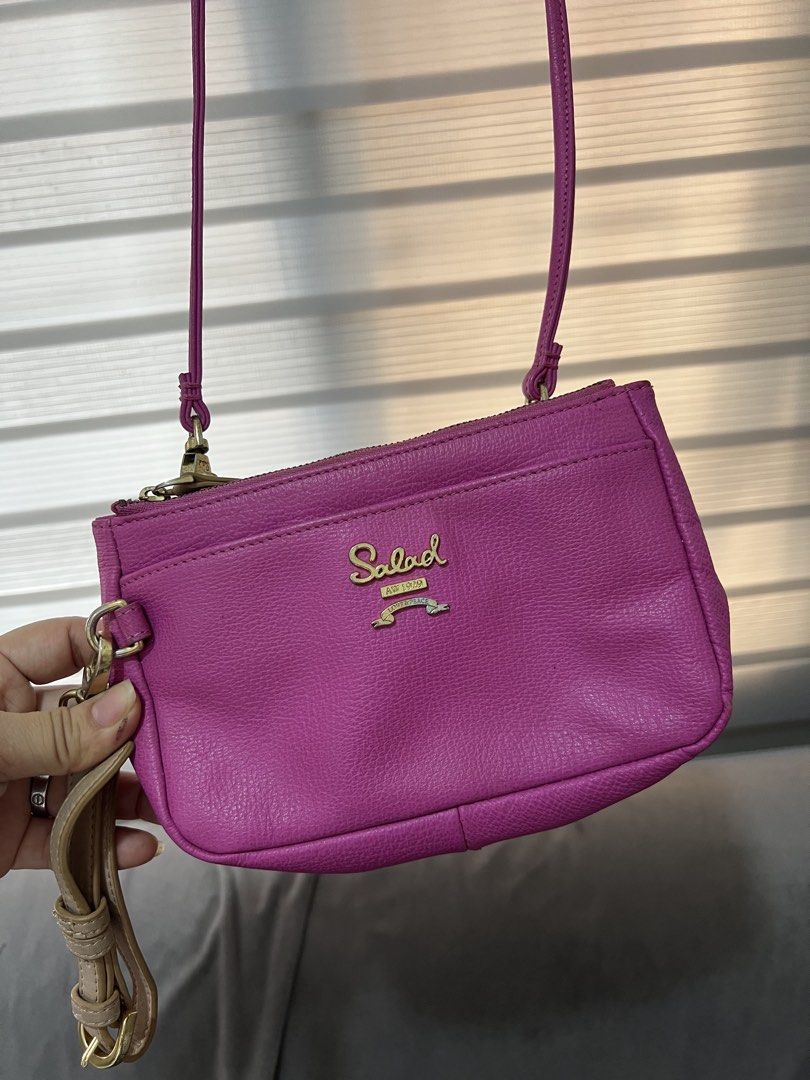 Salad Pink Leather 2way sling/wrislet (Category: Cross-body Bags) located in Las Pinas. Submitted by maple0305 (Listing ID 1449613397, Image 2). Description: - Cute pink crossbody bag from Salad - Genuine leather material - Main zippered compartment - Front pocket for easy access - Elegant gold hardware details - Adjustable strap for comfortable wear - Ideal size for carrying daily essentials.