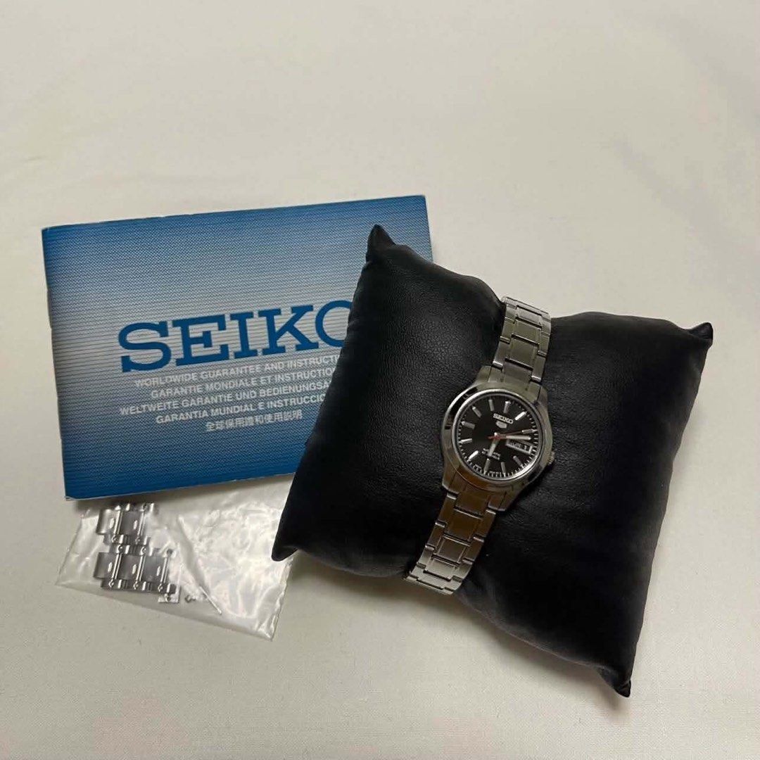 Seiko Watch with Guarantee and Instruction Manual (Category: Women's Watches) located in Las Pinas. Submitted by viedecluters (Listing ID 1449621402, Image 1). Description: - Authentic Seiko watch - Classic black dial with sleek silver band - Includes original worldwide guarantee and instruction manual - Extra bracelet links provided for a perfect fit - Ideal for everyday wear.