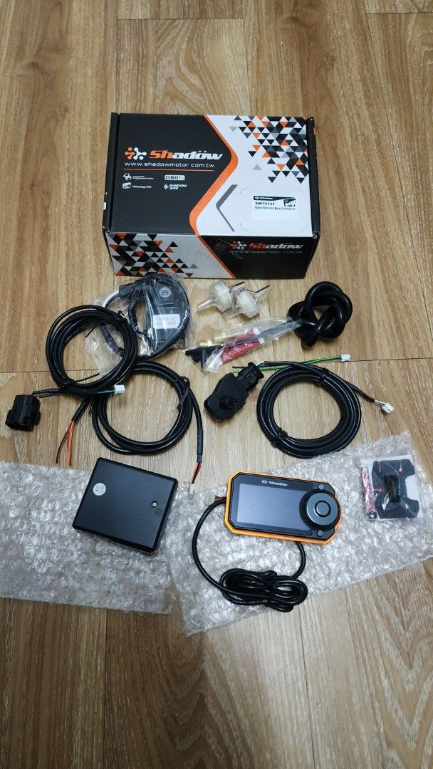 Shadow Digital Electronic Boost Controller (Category: ECU) located in Singapore. Submitted by luckyangel0421 (Listing ID 1449589956, Image 2). Description: - Shadow SW10141 Digital Electronic Boost Controller - All parts included in the box - Includes main unit, wiring, and sensors - Ideal for car enthusiasts.