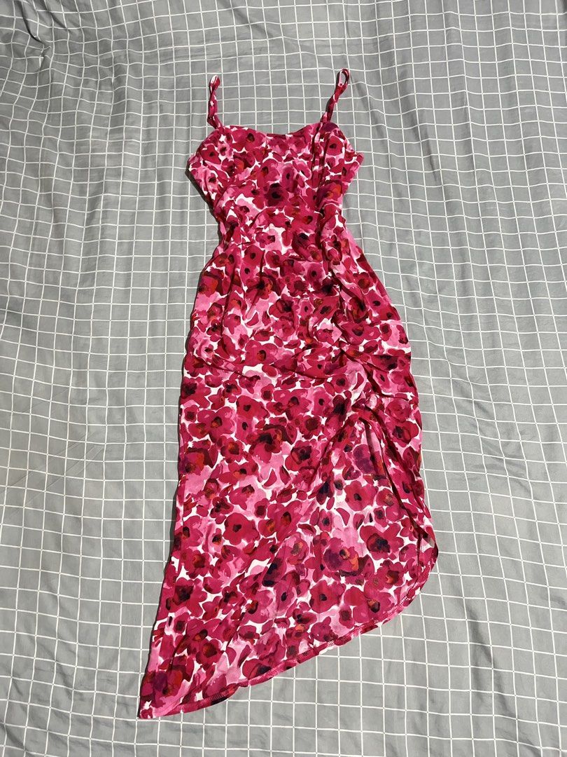 SHEIN Floral Print Ruched Side Split Midi Dress (Category: Dresses) located in Manila. Submitted by az0r_ (Listing ID 1449652666, Image 1). Description: - Cute pink floral print midi dress - Brand: SHEIN - Features: Spaghetti straps, ruched side detail, thigh-high split, asymmetrical hemline - Versatile: Great for a night out or casual day - Size: XS.