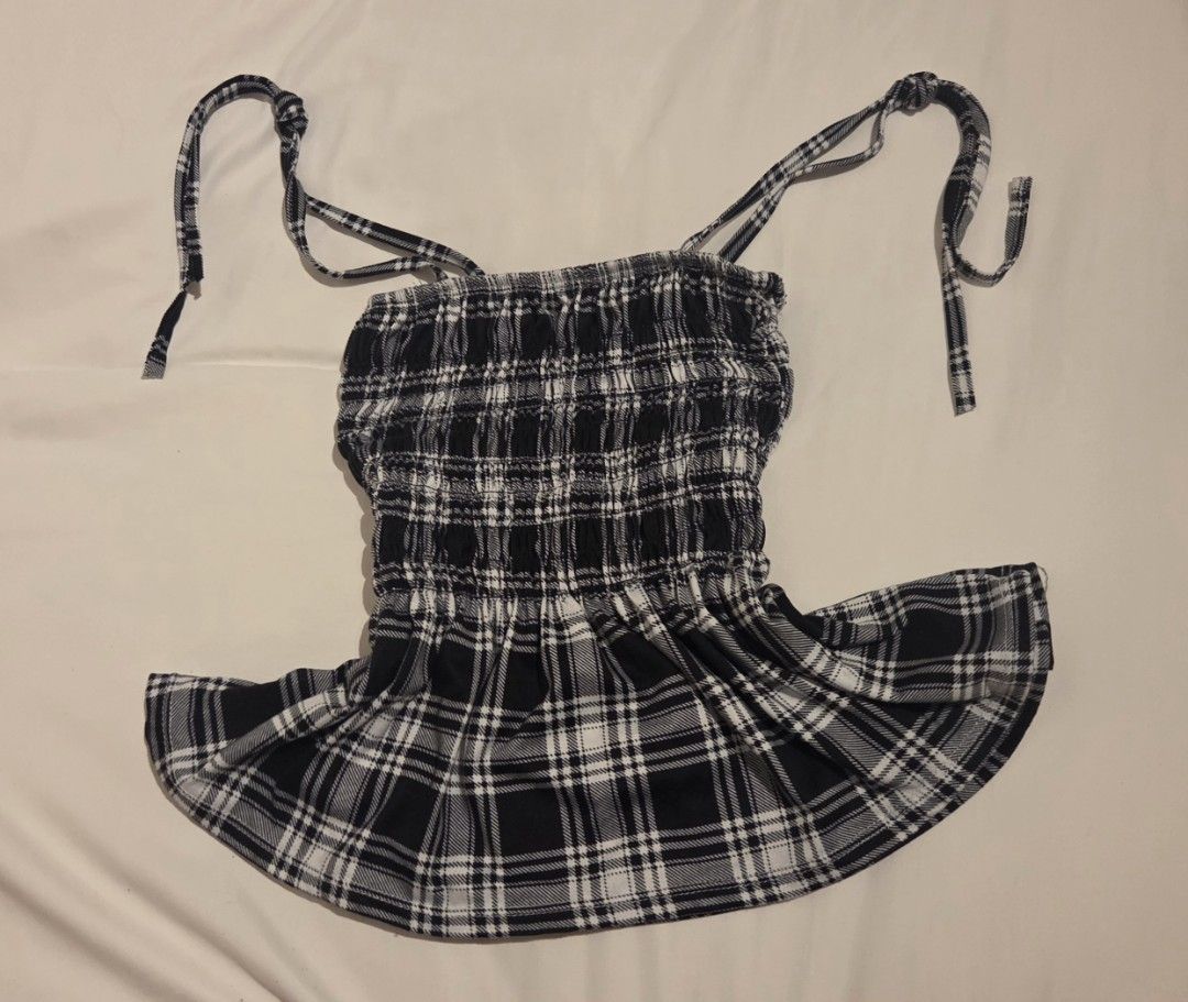 Sleeveless Self-tie Peplum Top S (Category: Sleeveless) located in Makati City. Submitted by mandy.stuff (Listing ID 1449654472, Image 1). Description: Length: 35 cm / 14 in 200 + shipping fee.