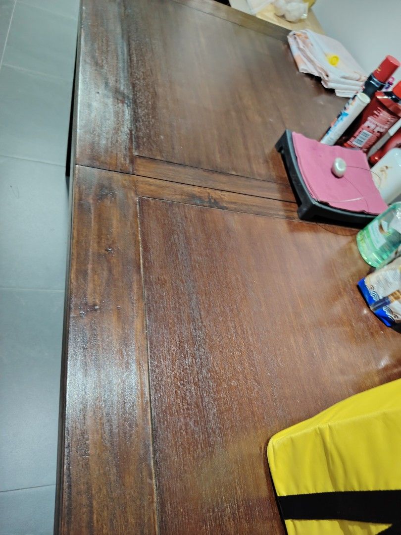 Solid Wood Dining Table (Category: Tables & Sets) located in Singapore. Submitted by cassie_12 (Listing ID 1449668355, Image 3). Description: - Solid wood dining table - Dark brown finish - Rectangular shape - Seats 6 to 8 person - solid wood - extendable.