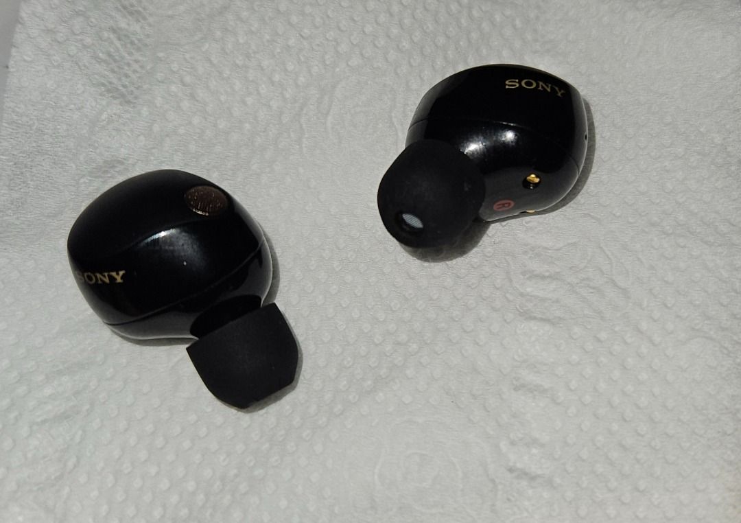 Sony Black WF-1000XM5 Wireless Earbuds with Charging Case (Category: Earphones) located in Pasig City. Submitted by curt_aquino08 (Listing ID 1449614680, Image 3). Description: - Black Sony WF-1000XM5 wireless earbuds - Includes charging case and USB-C cable - Multiple ear tip sizes for a perfect fit - Changed of ANC earbuds. - Slighty used for 2 to 3 weeks w/ 1 year warranty and original receipt inside the box. -Negotiable price up to 7k see ori