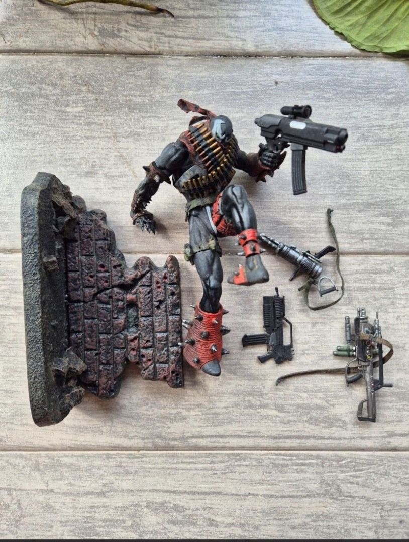 Spawn 11 (Commando Spawn) (Category: Toy Figures) located in Singapore. Submitted by theshadow17 (Listing ID 1449682909, Image 1). Description: - Spawn Series 31 "Other Worlds" - This specific Spawn 11 figure is famous for its dynamic base: an intricate, bullet-riddled brick wall diorama that Spawn is depicted jumping over while holding heavy weapons. - Complete with all accessories and weapons NOT Marvel Legends, DC Universe, Mezco, Transformers