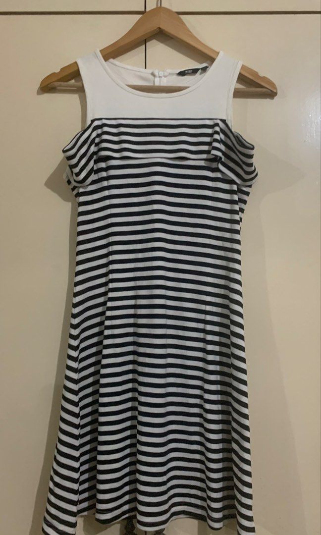 Striped Cold Shoulder Dress (Category: Dresses) located in Paranaque City. Submitted by vbvessentials (Listing ID 1449704988, Image 1). Description: - Stylish cold shoulder design - Black and white striped skirt - Convenient back zipper closure - Approx. 34 inches in length - Approx. 28 inches at the waist - Ideal for casual outings and everyday wear -large on tag but fits medium frame.