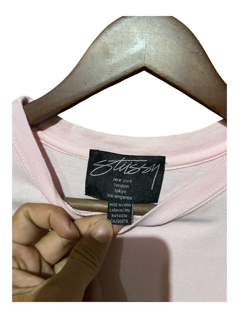 Stussy Pink T-Shirt (Category: Tshirts & Polo Shirts ) located in Madridejos. Submitted by keeno_14 (Listing ID 1449674608, Image 3). Description: - Pink Stussy T-Shirt - Features classic Stussy logo on front and back - Made in China - 100% Cotton - Ideal for casual wear.