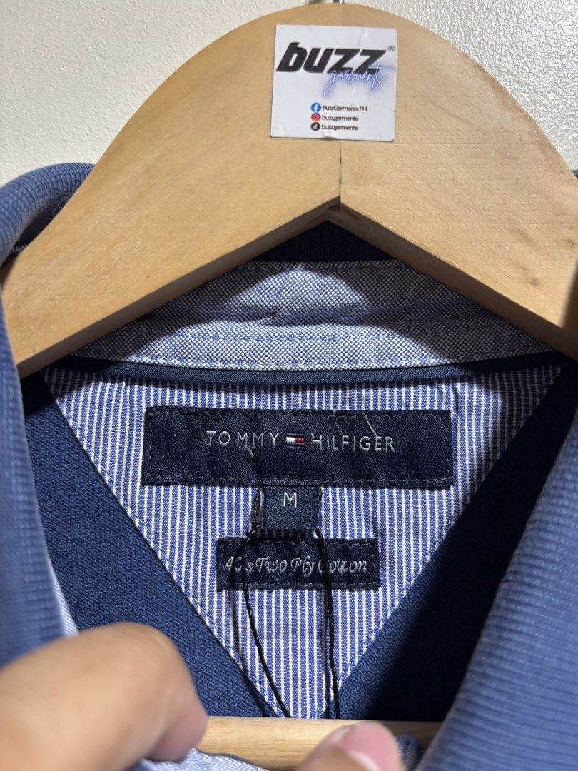 Tommy Hilfiger Polo Shirt (Category: Tshirts & Polo Shirts ) located in Manila. Submitted by buzz.garments (Listing ID 1449656123, Image 2). Description: Size: Medium Width: 19” Length: 29” - color may vary due to lighting. please manage your expectations-minimal and unseen flaws must be considered..