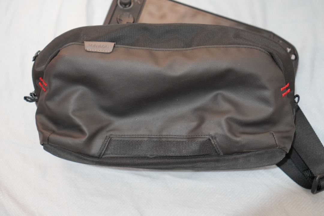 Tomtoc G47 Sling Bag for Handheld PC / Nintendo Switch 1 / 2 (Category: Laptop Bags & Sleeves) located in Makati City. Submitted by ronbelleza (Listing ID 1449554648, Image 1). Description: Good as new Legion Go 2 for size reference .