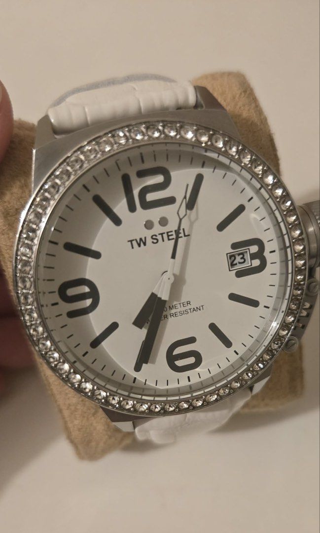 TW Steel White Dial Crystal Bezel Watch (Category: Luxury Watches) located in Manila. Submitted by xiaauma (Listing ID 1449654252, Image 2). Description: - TW Steel watch - White dial - Date display at 3 o'clock - Bezel with clear crystals - White strap - Original price was 14k pesos - Water resistant up to 100 meters.