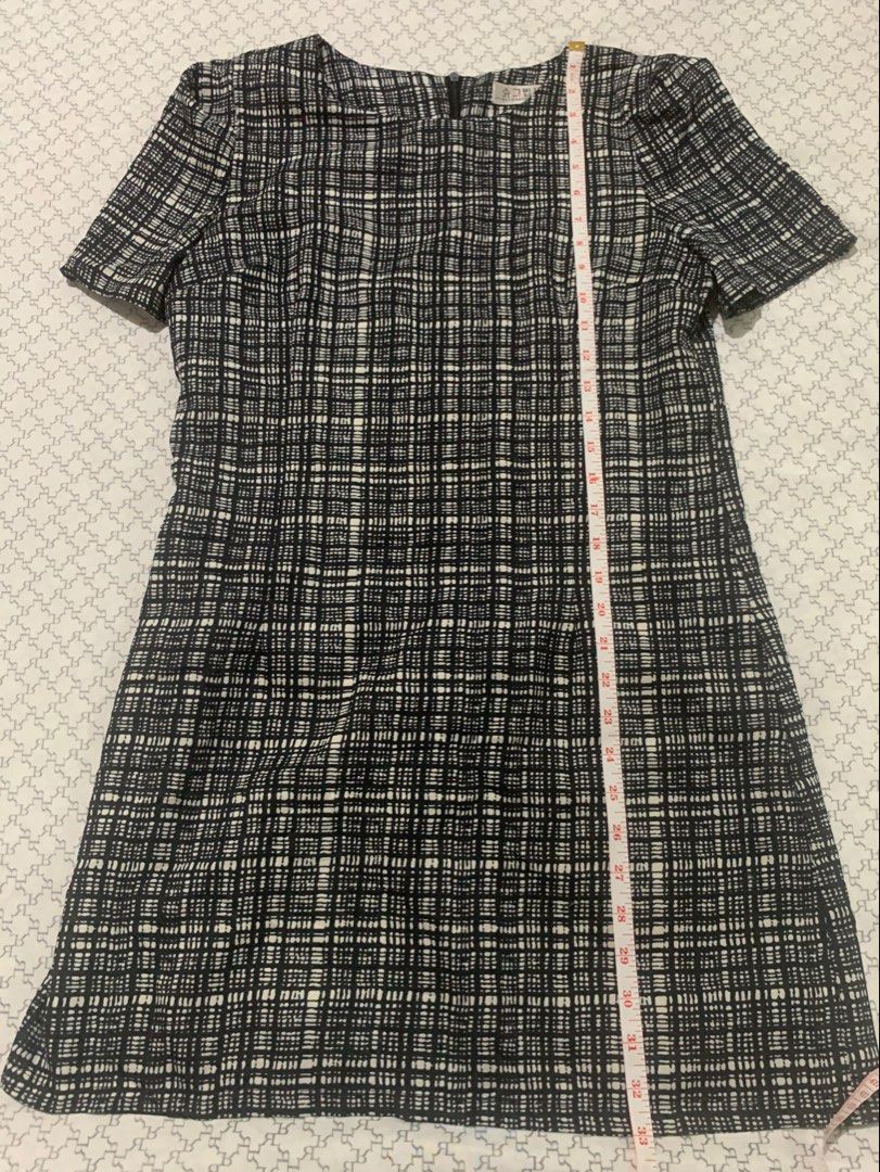 Tweed Pattern Short Sleeve Dress (Category: Dresses) located in Paranaque City. Submitted by vbvessentials (Listing ID 1449702305, Image 3). Description: - Classic tweed pattern dress - Short sleeves - Simple silhouette - Back zipper closure - Versatile for work or casual outings - Measurements: Pit to pit 17 inches, length 33 inches - Fits like a small.