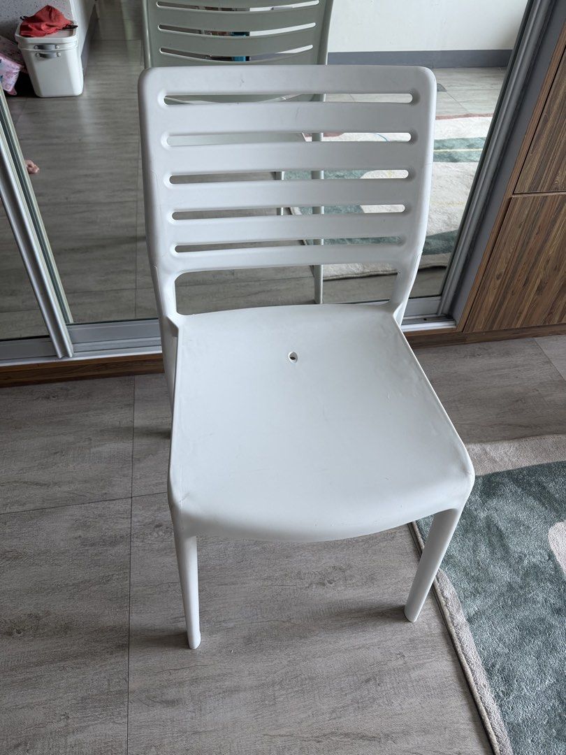 Uratex Olympia Bistro Chair (Category: Chairs) located in Paranaque City. Submitted by hellolala.94 (Listing ID 1449621527, Image 2). Description: - Stackable white plastic chair for space-saving storage. - Simple and modern design fits any decor. - Versatile use: perfect for dining or as an extra seat. - Features a small hole in the seat. - Minor scuffs on the surface. .