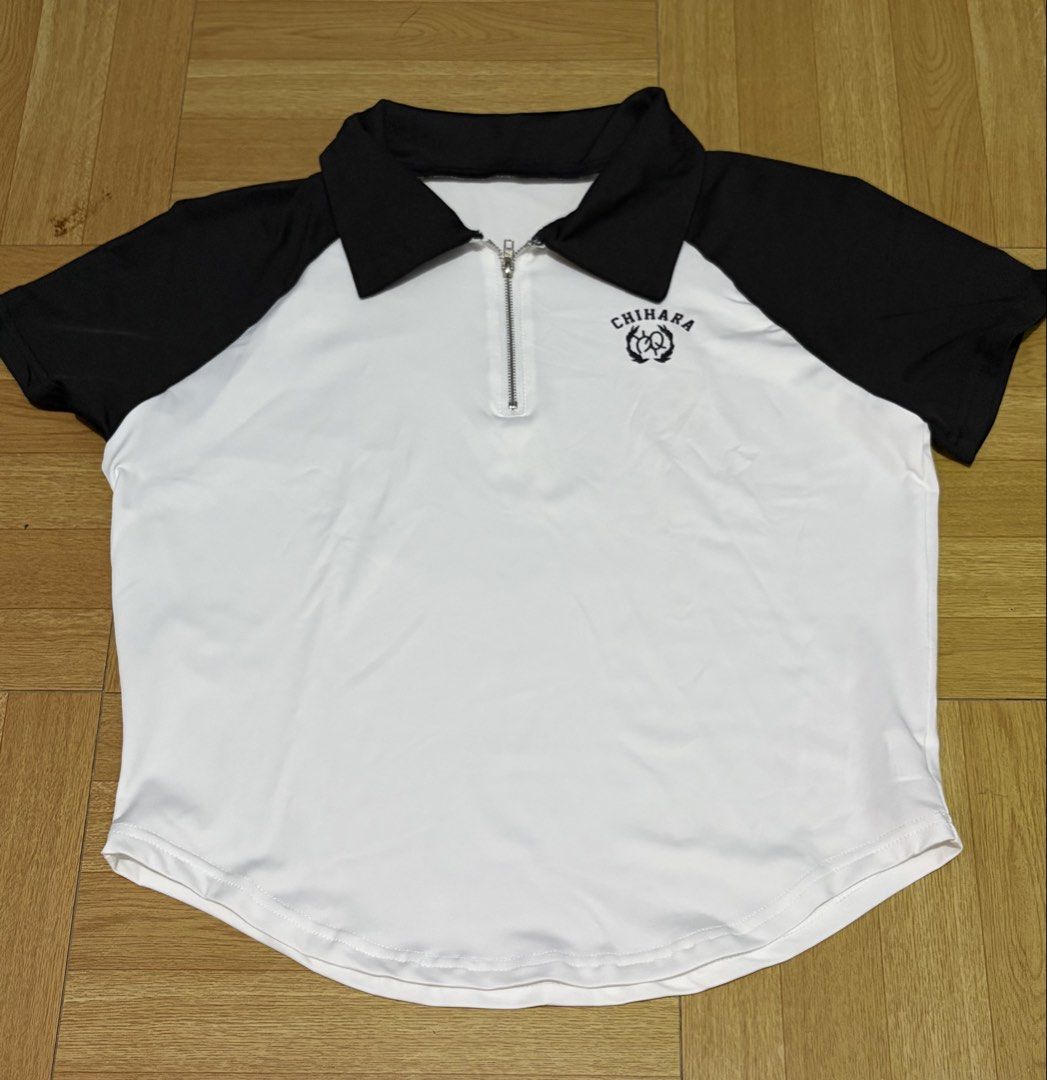 White & Black Zip Collar Polo Shirt (Category: Shirts) located in Rizal. Submitted by haniijeong (Listing ID 1449534766, Image 1). Description: - Black and white polo shirt - Used once - Bought from lovito for 199 - Good condition.