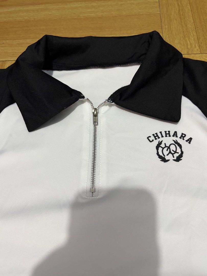 White & Black Zip Collar Polo Shirt (Category: Shirts) located in Rizal. Submitted by haniijeong (Listing ID 1449534766, Image 3). Description: - Black and white polo shirt - Used once - Bought from lovito for 199 - Good condition.