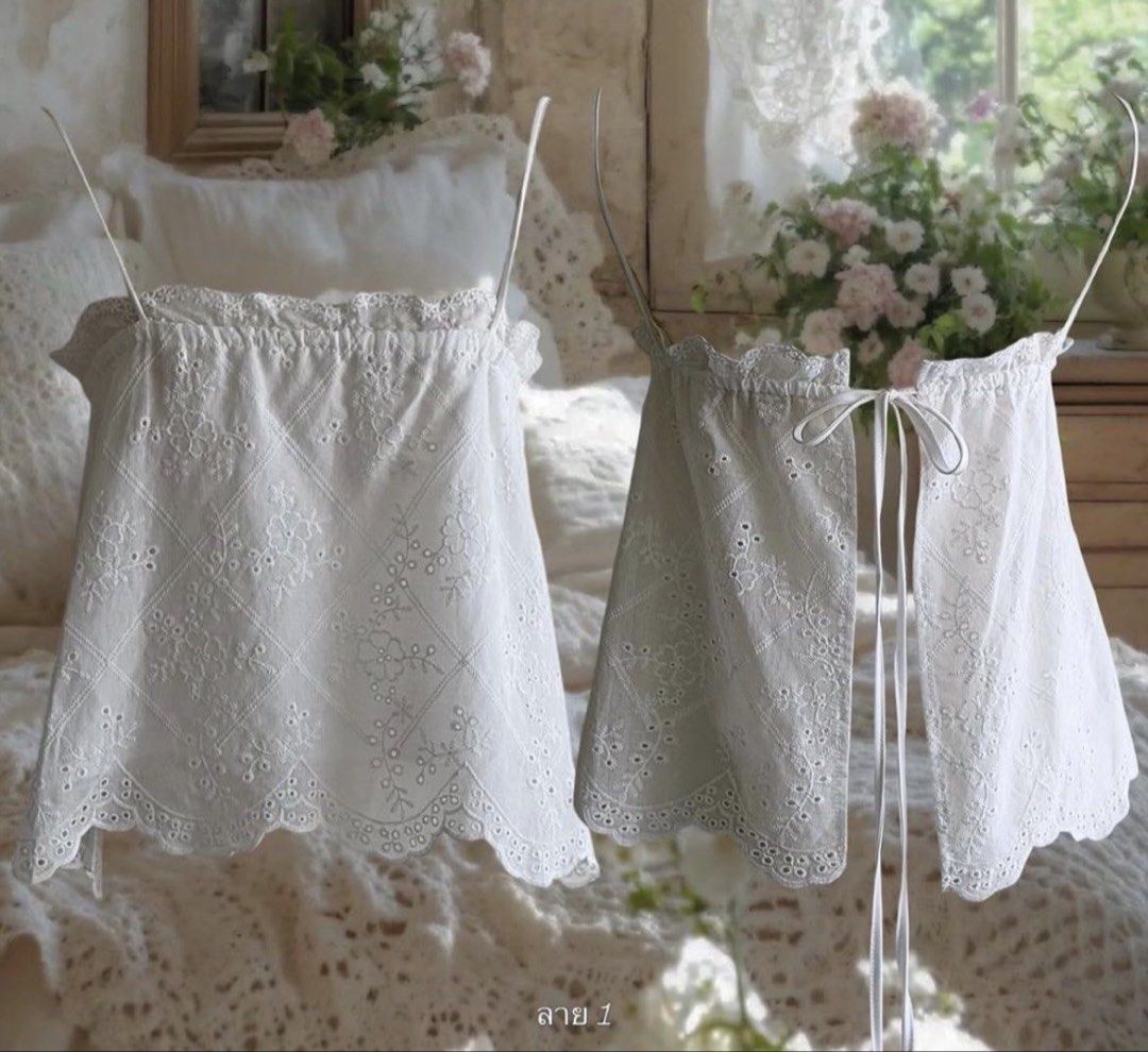 White eyelet summer top (Category: Sleeveless) located in Tuguegarao City. Submitted by declutterf (Listing ID 1449595179, Image 1). Description: White eyelet top that’s so pretty when worn I cut the straps so I can tie it around my neck (better imo) Actual when worn posted Bought in thailand Helping tags: zara, h&m, uniqlo.