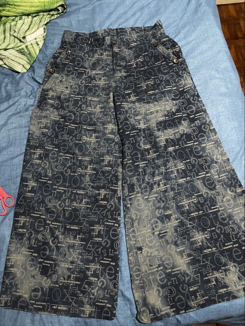 Wide Leg Pants with All-Over Text Print (Category: Jeans) located in Quezon City. Submitted by listless32 (Listing ID 1449553235, Image 1). Description: Waist 34 L 41 Cool wide leg denim pants with unique text/number print. Dark wash, faded effect, high waist, button closure, front/back pockets. Statement piece, comfy & stylish..