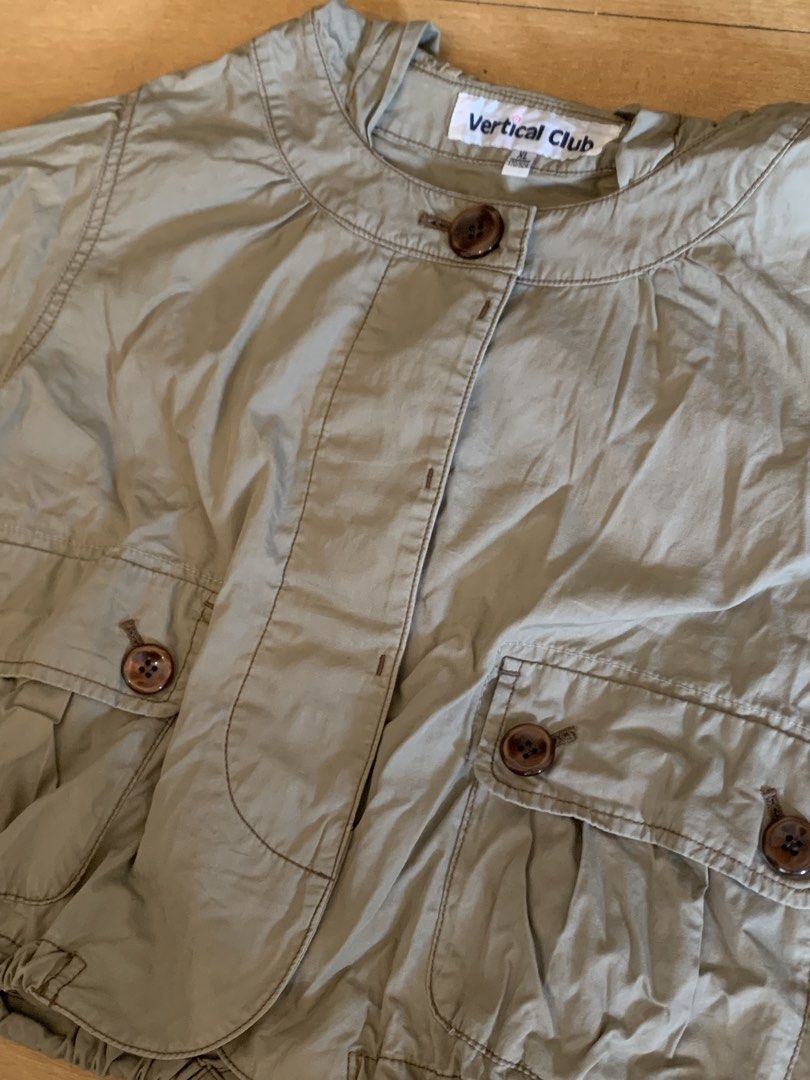 y2k Vertical Club Cropped Hooded Jacket (Category: Coats, Jackets and Outerwear) located in Antipolo. Submitted by cewenz (Listing ID 1449597916, Image 3). Description: - size: m-l - Features short sleeves and a hood - Adjustable drawstring at the hem - Button-up closure .