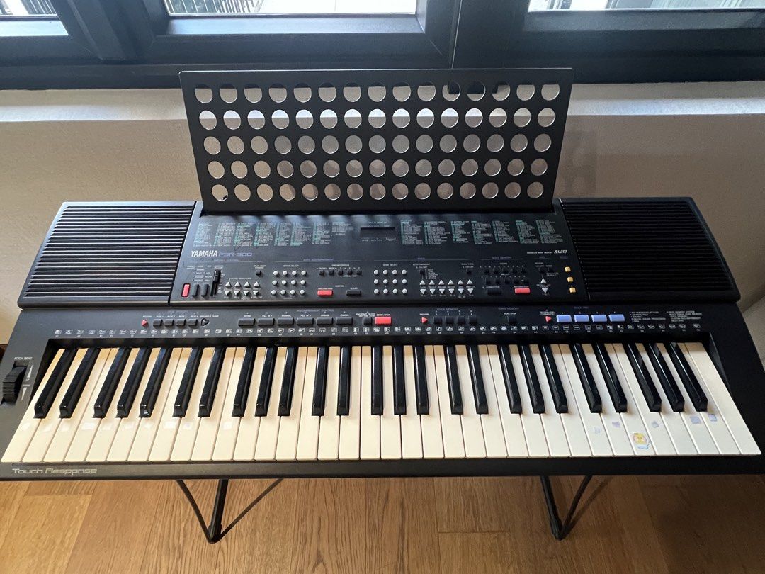 Yamaha PSR-500 Electronic Keyboard with Stand (Category: Musical Instruments) located in Pasig City. Submitted by cheryl.tan.1 (Listing ID 1449588213, Image 3). Description: - Yamaha PSR-500 keyboard - Touch response feature - Includes music stand - Comes with a metal stand - Ideal for learning and playing - All keys and buttons intact - Ready for its new home.